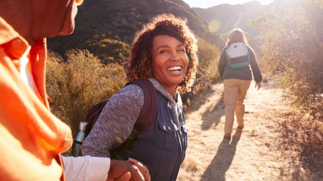 people hiking and smiling